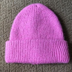Darling pink ribbed knit beanie. Cute addition to any outfit!